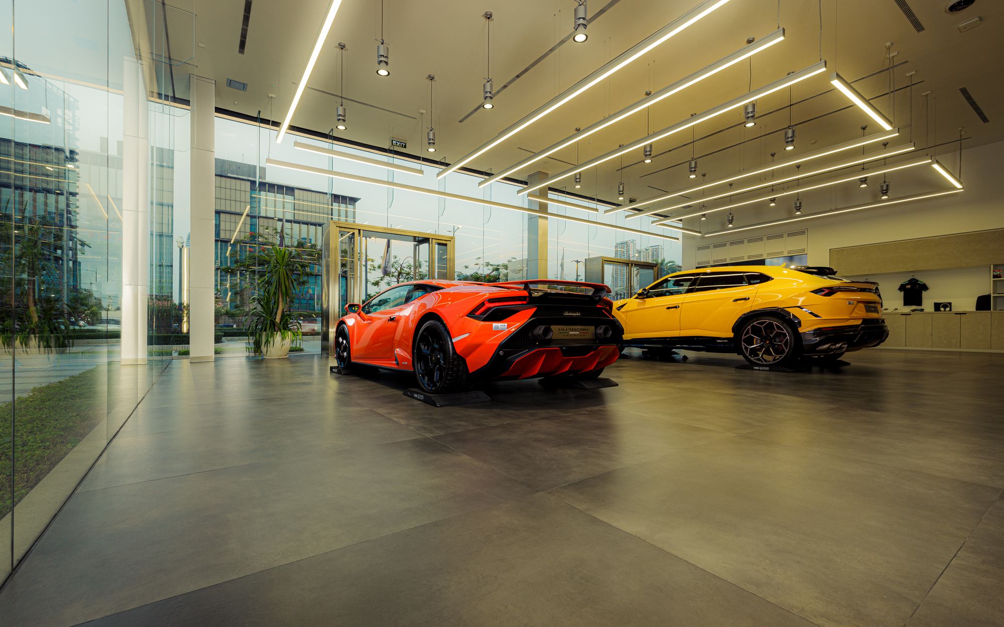 Modern sports cars inside a refined showroom